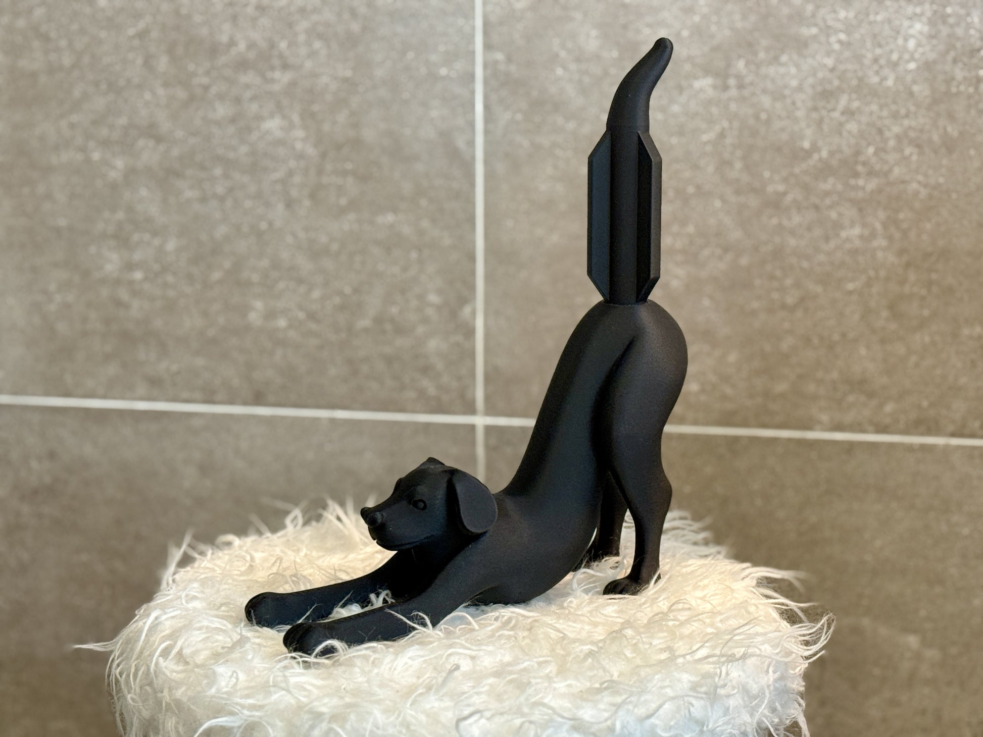 The Stretching Dog Toilet Paper Holder