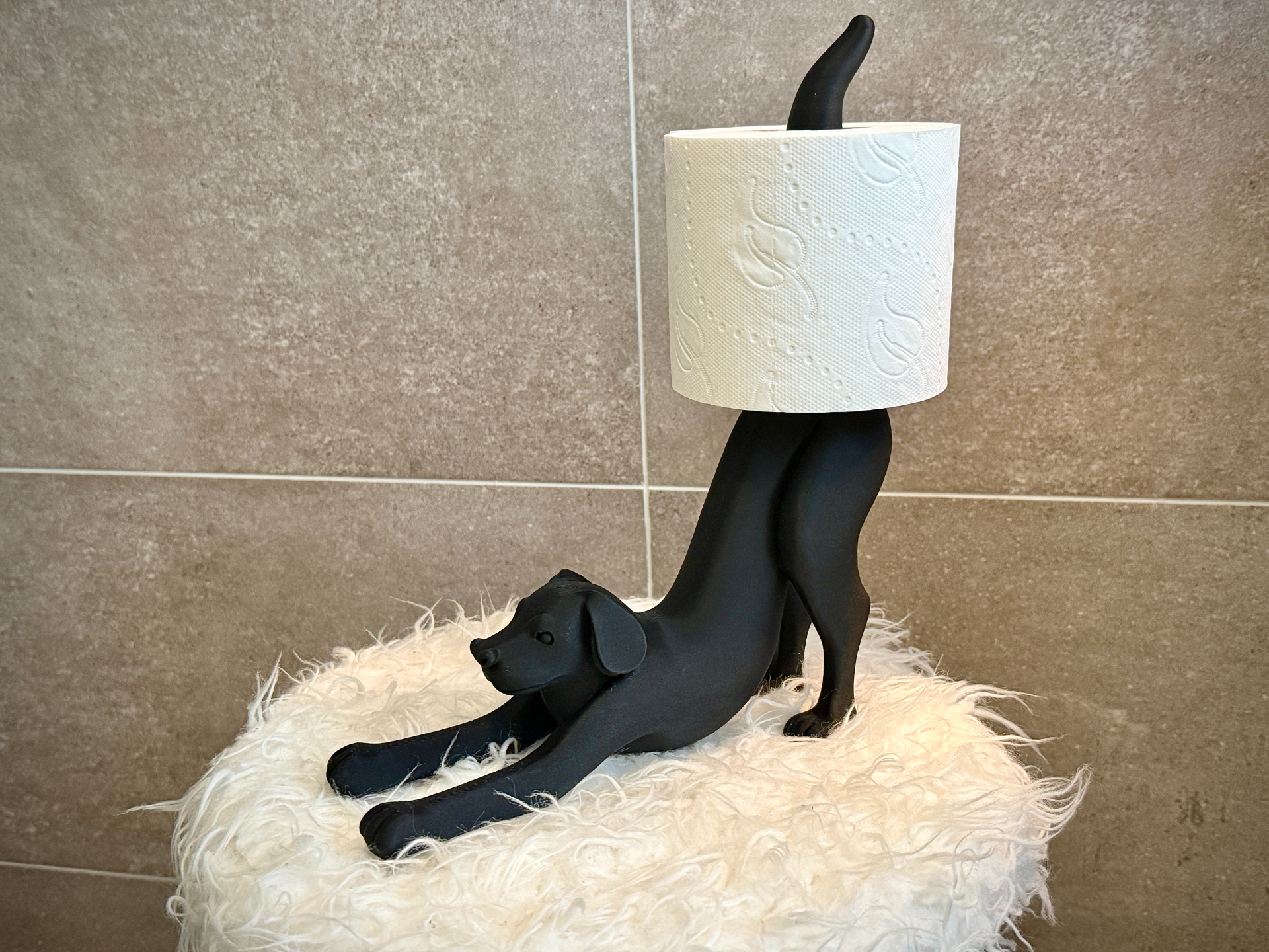 The Stretching Dog Toilet Paper Holder