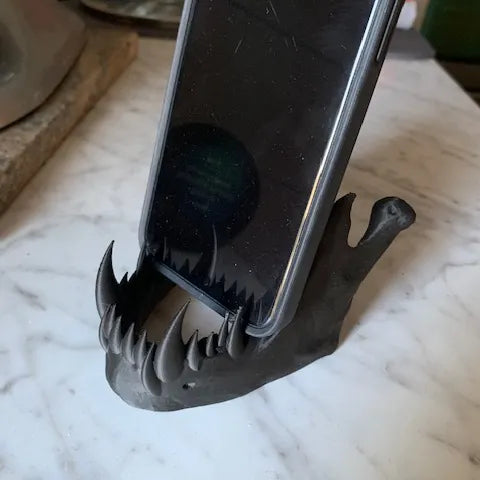 Fangs phone stand
