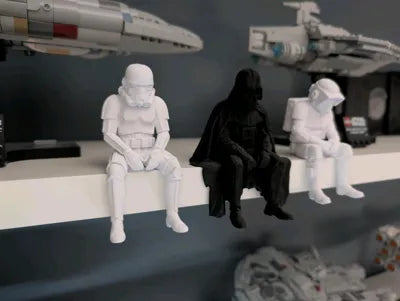 Sad Storm Trooper sitting on a ledge Figurine!