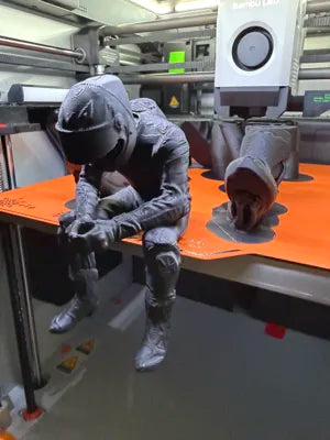 Sad MotoGP Rider on a ledge Figurine!
