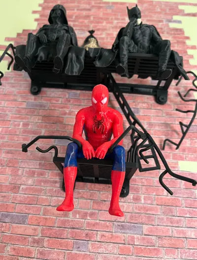 Sad Batman sitting on a Ledge Figurine!