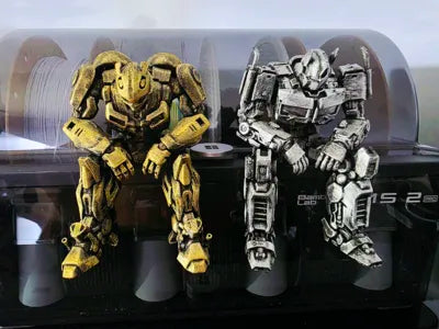 Sad Optimus Prime sitting on a ledge figurine!