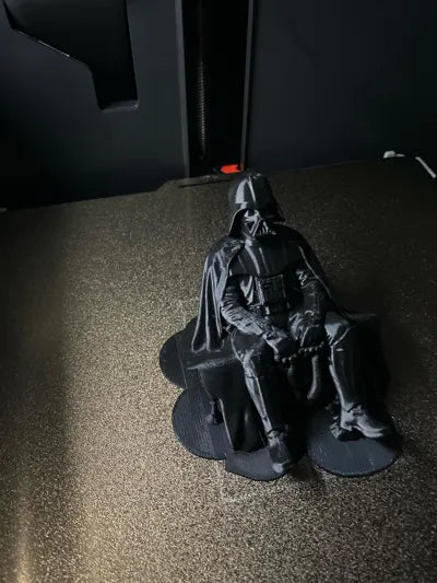 Sad Darth Vader sitting on a ledge figurine!