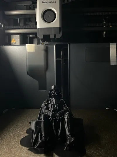 Sad Darth Vader sitting on a ledge figurine!