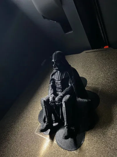 Sad Darth Vader sitting on a ledge figurine!