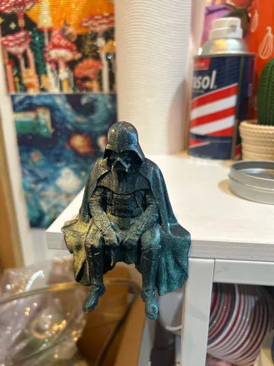 Sad Darth Vader sitting on a ledge figurine!