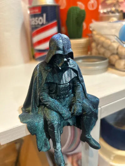 Sad Darth Vader sitting on a ledge figurine!