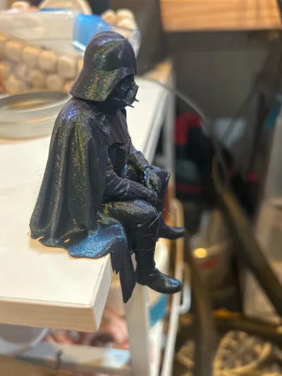 Sad Darth Vader sitting on a ledge figurine!