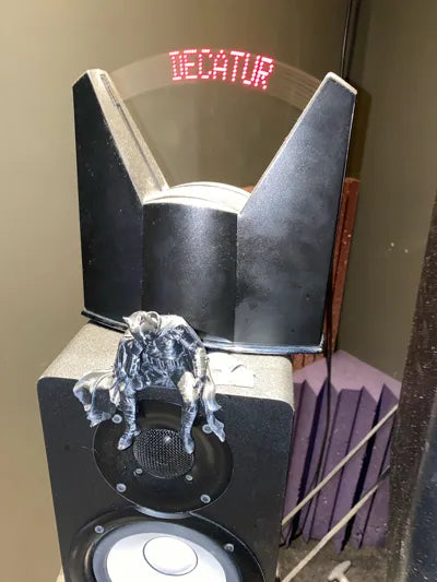 Sad Batman sitting on a Ledge Figurine!