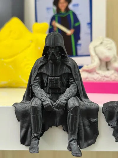 Sad Darth Vader sitting on a ledge figurine!