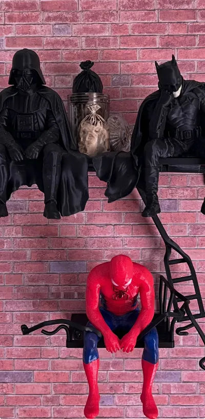 Sad Batman sitting on a Ledge Figurine!