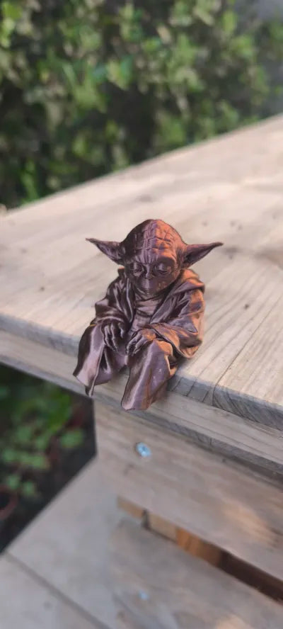 Sad Yoda Figurine on a Ledge!