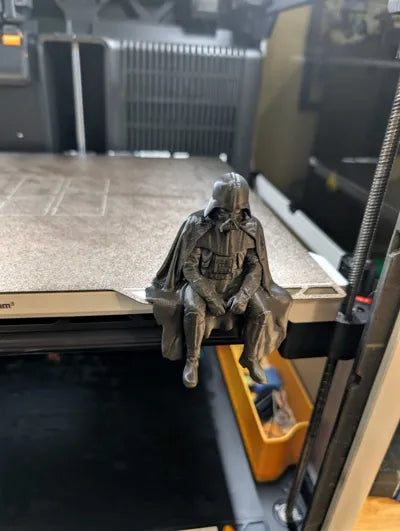 Sad Darth Vader sitting on a ledge figurine!