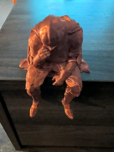 Sad Knight sitting on a ledge Figurine!