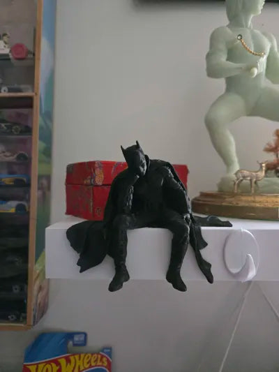 Sad Batman sitting on a Ledge Figurine!