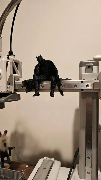 Sad Batman sitting on a Ledge Figurine!