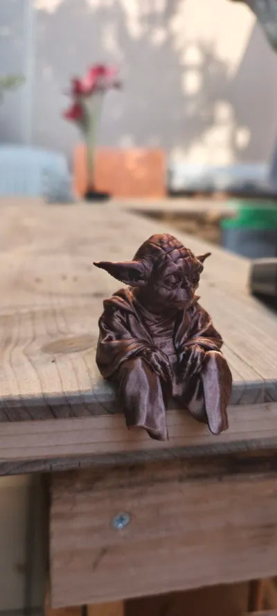 Sad Yoda Figurine on a Ledge!