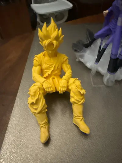Sad Goku Figurine Sitting on a ledge!