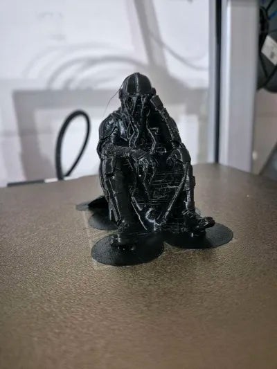 Sad Mandalorian on a ledge Figurine!