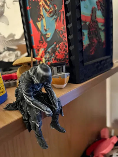 Sad Assassin's Creed sitting on a ledge Figurine