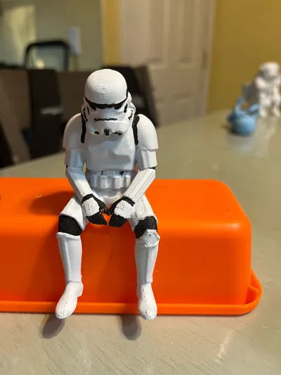 Sad Storm Trooper sitting on a ledge Figurine!