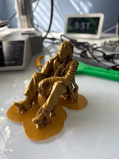 Sad Joker Figurine sitting on a ledge!