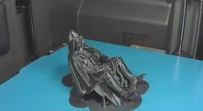 Sad Darth Vader sitting on a ledge figurine!