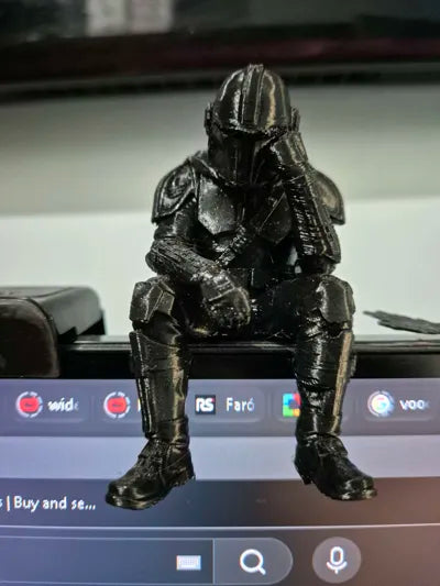 Sad Mandalorian on a ledge Figurine!