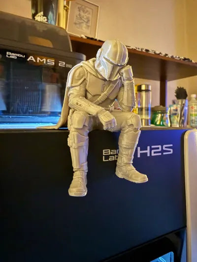 Sad Mandalorian on a ledge Figurine!