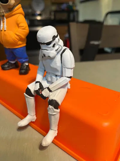 Sad Storm Trooper sitting on a ledge Figurine!