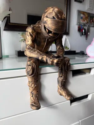 Sad MotoGP Rider on a ledge Figurine!