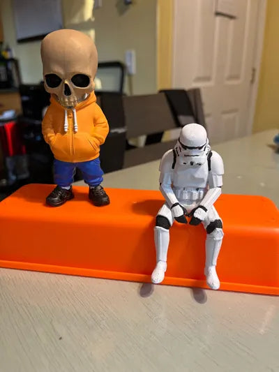 Sad Storm Trooper sitting on a ledge Figurine!