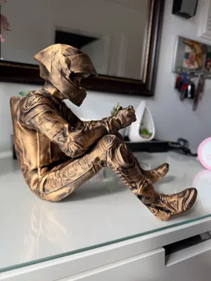 Sad MotoGP Rider on a ledge Figurine!