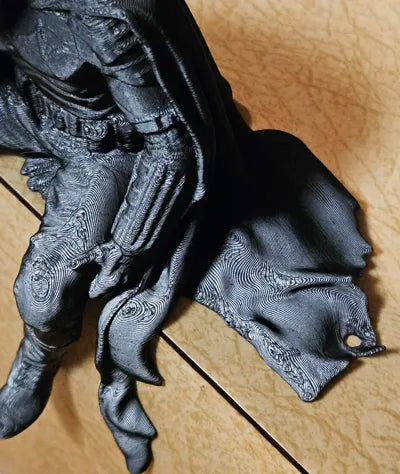 Sad Batman sitting on a Ledge Figurine!