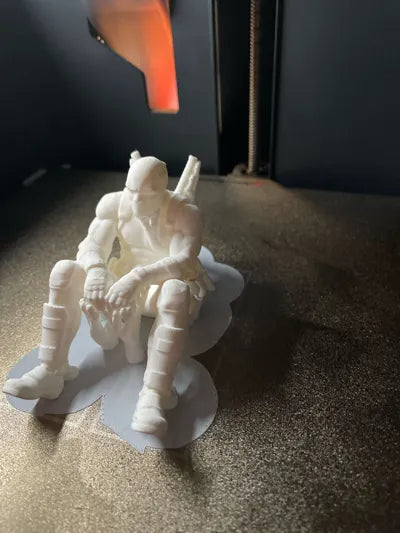 Sad Deadpool sitting on a ledge Figurine!