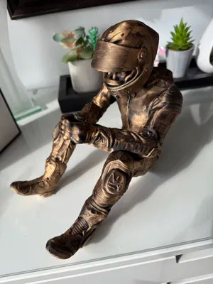 Sad MotoGP Rider on a ledge Figurine!