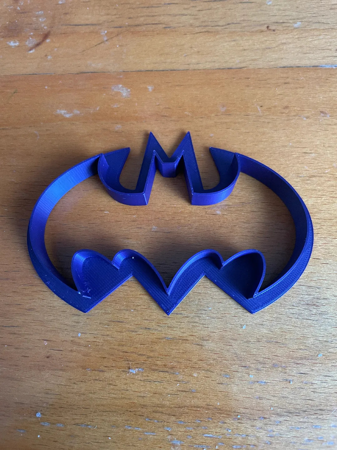 Cookie cutter in shape of batman signal