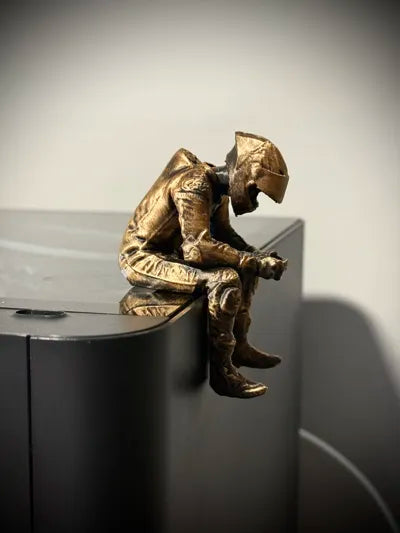 Sad MotoGP Rider on a ledge Figurine!