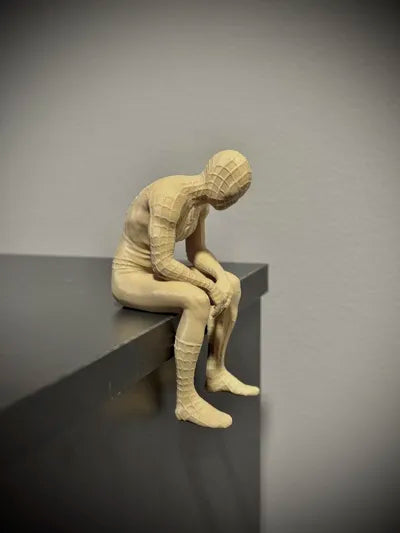 Sad Spiderman Sitting on a Ledge Figurine!