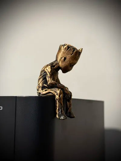 Sad Groot Figurine sitting on a ledge!