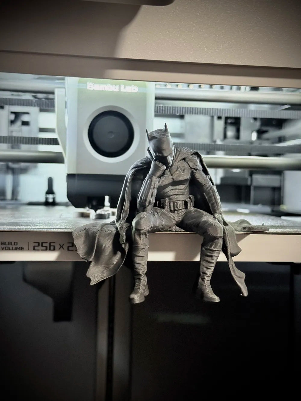 Sad Batman sitting on a Ledge Figurine!
