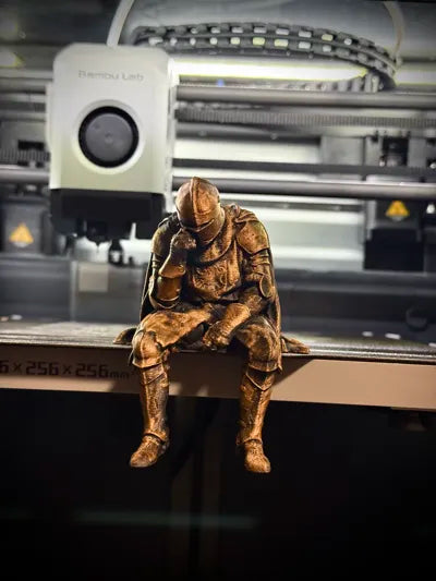 Sad Knight sitting on a ledge Figurine!