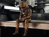 Sad F1 Driver Sitting on a ledge Figurine!