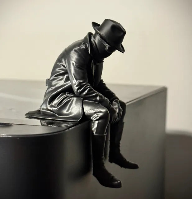 Sad Spider Noir Figurine sitting on a ledge!