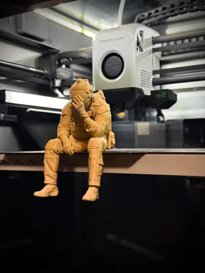 Sad Soldier sitting on a ledge Figurine!