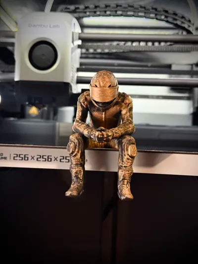Sad MotoGP Rider on a ledge Figurine!