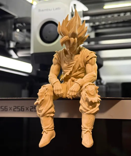 Sad Goku Figurine Sitting on a ledge!