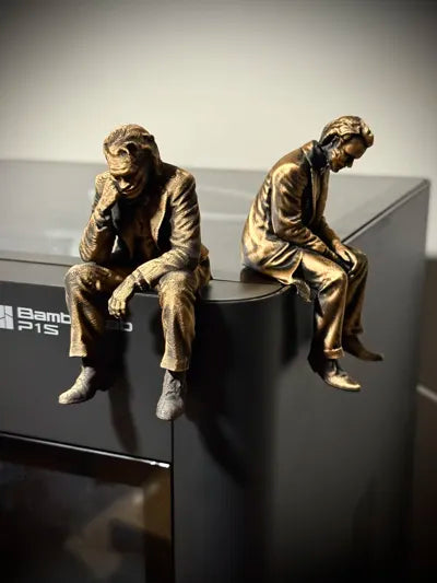Sad Joker Figurine sitting on a ledge!