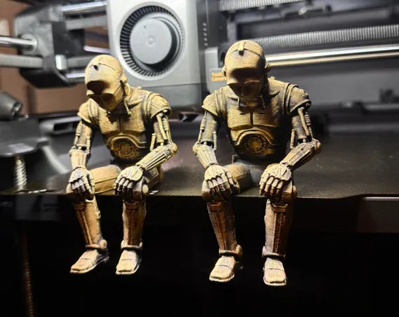 Sad C-3PO Star Wars Figurine sitting on a ledge!